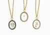 Angel pendants with malachite stones