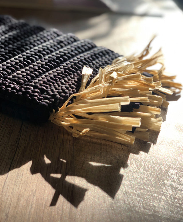 waterproof crochet raffia bag designed by Alexandra Koumba