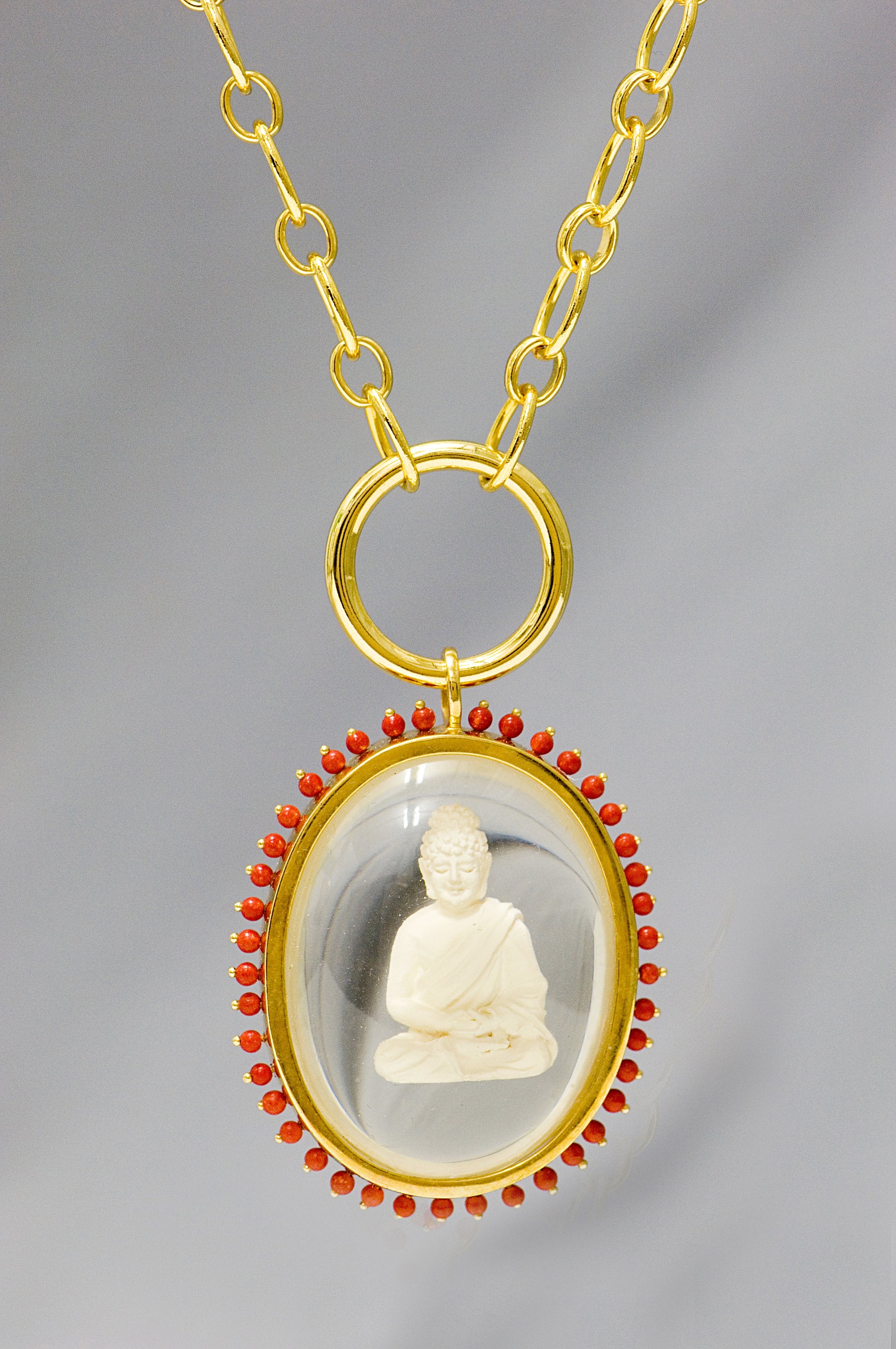 Buddha pendant with stones