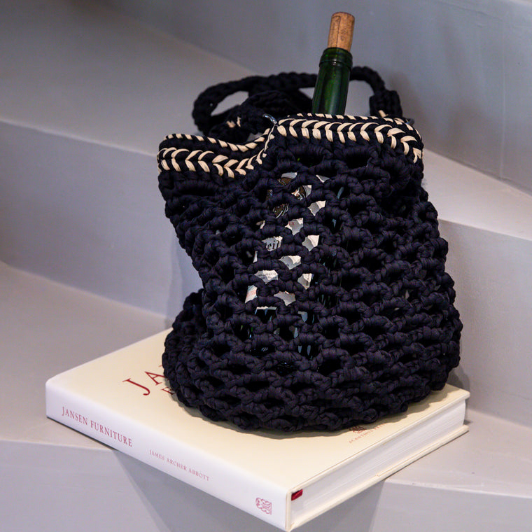 Fishnet raffia Daybag designed by alexandra koumba