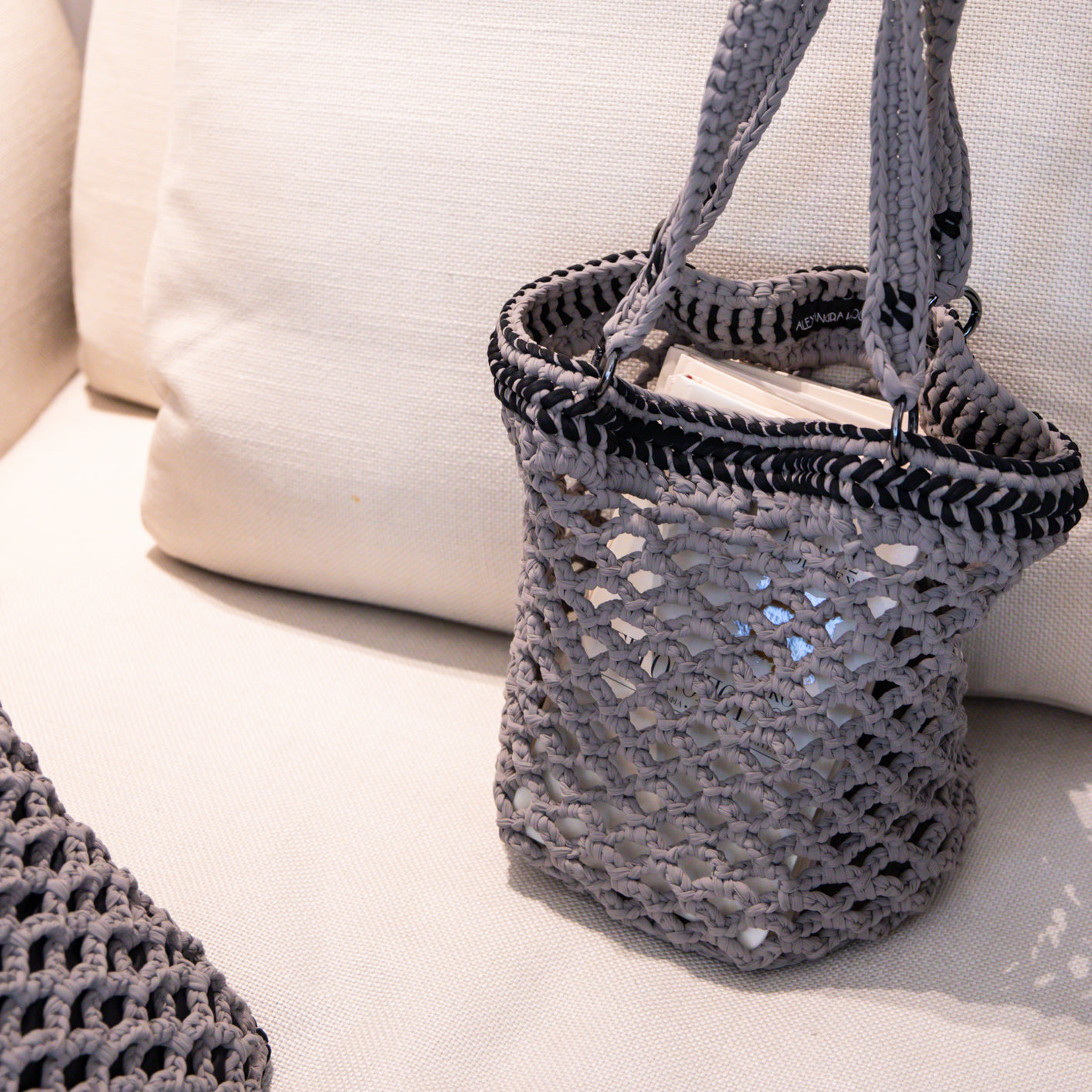Fishnet raffia Daybag designed by alexandra koumba