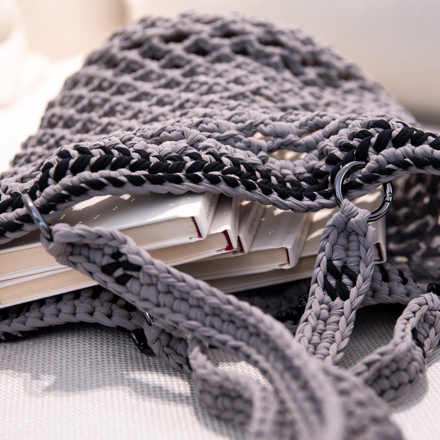 Fishnet raffia Daybag designed by alexandra koumba