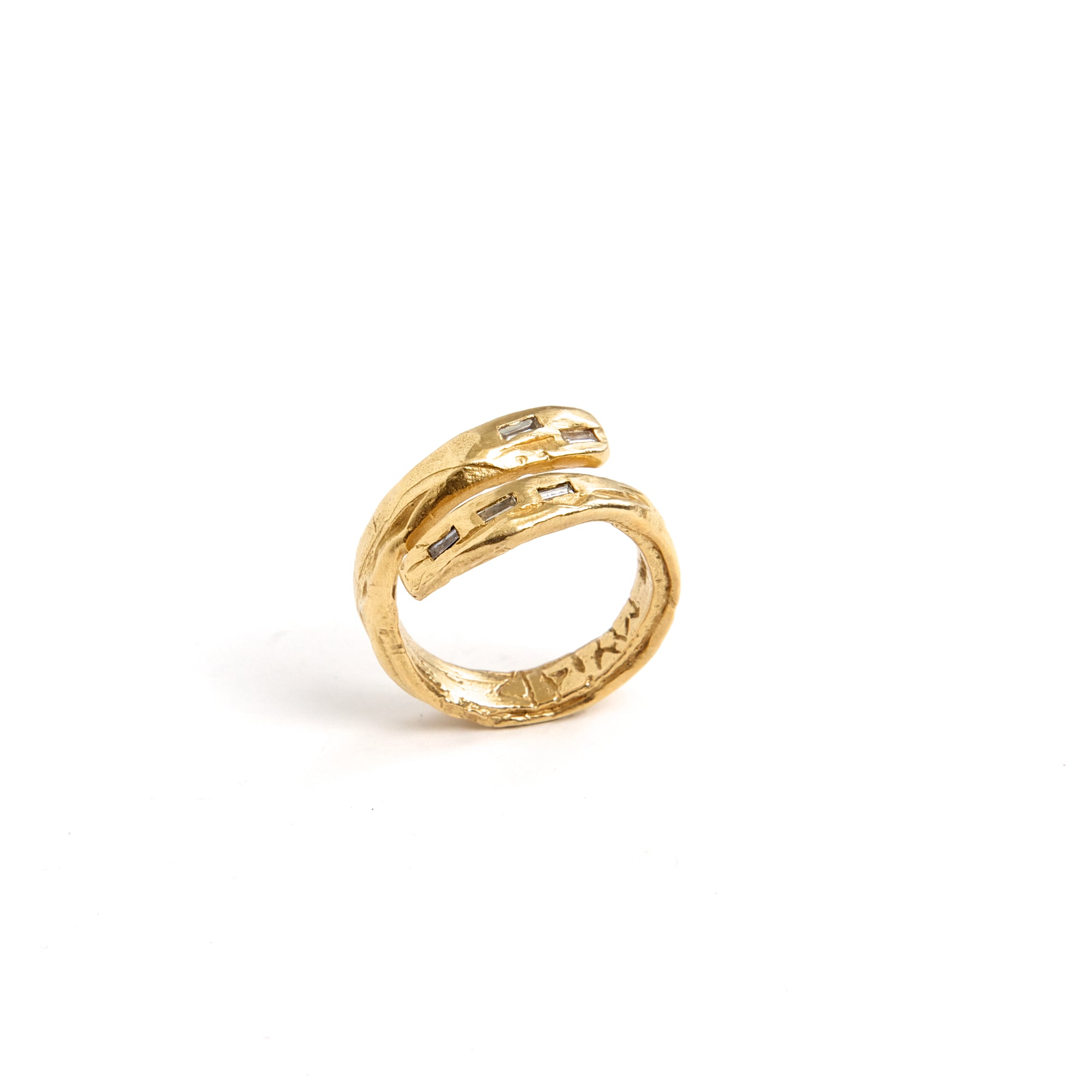 Spine Ring Set in gold with diamond baguettes