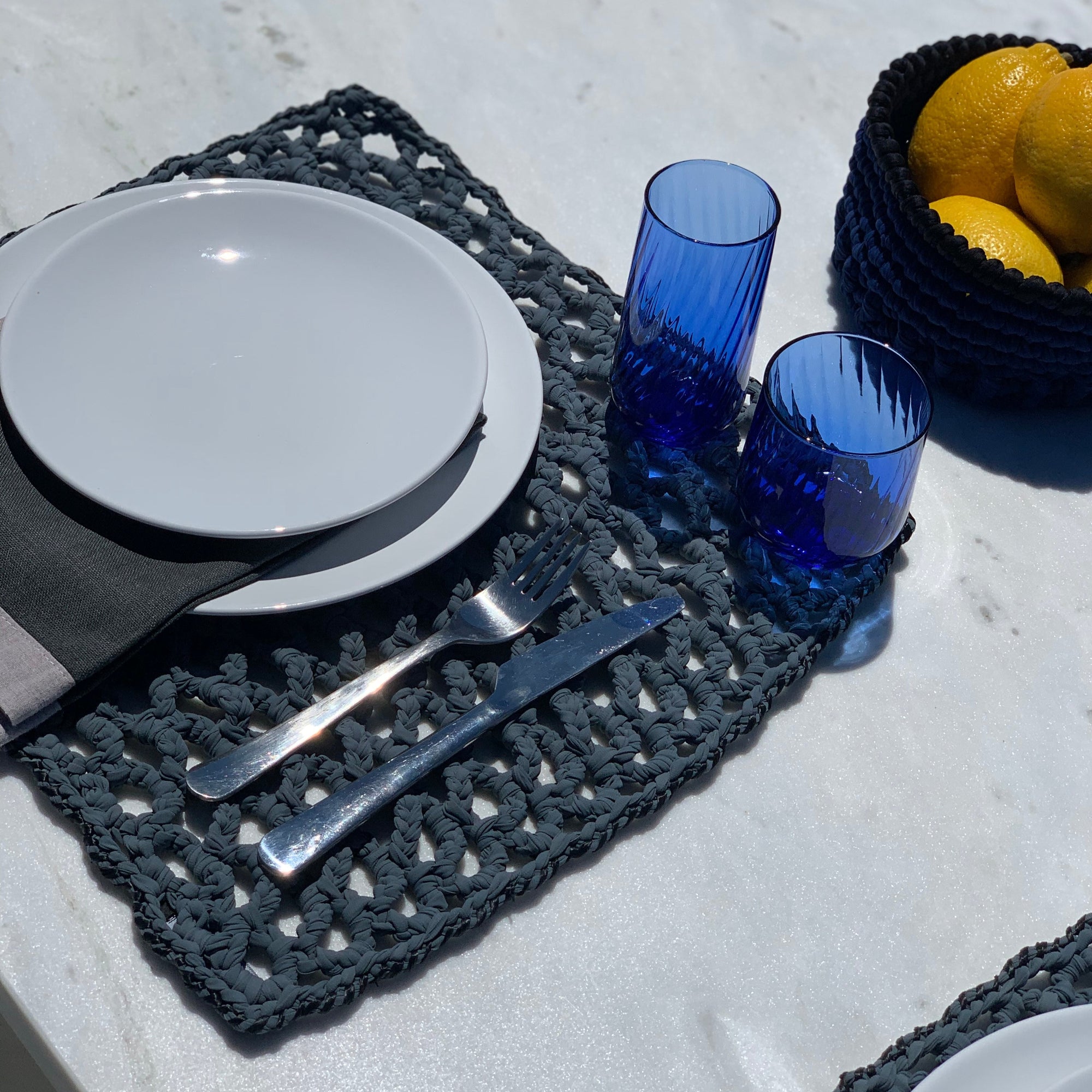 Raffia Square table set for 4 people designed by alexandra koumba