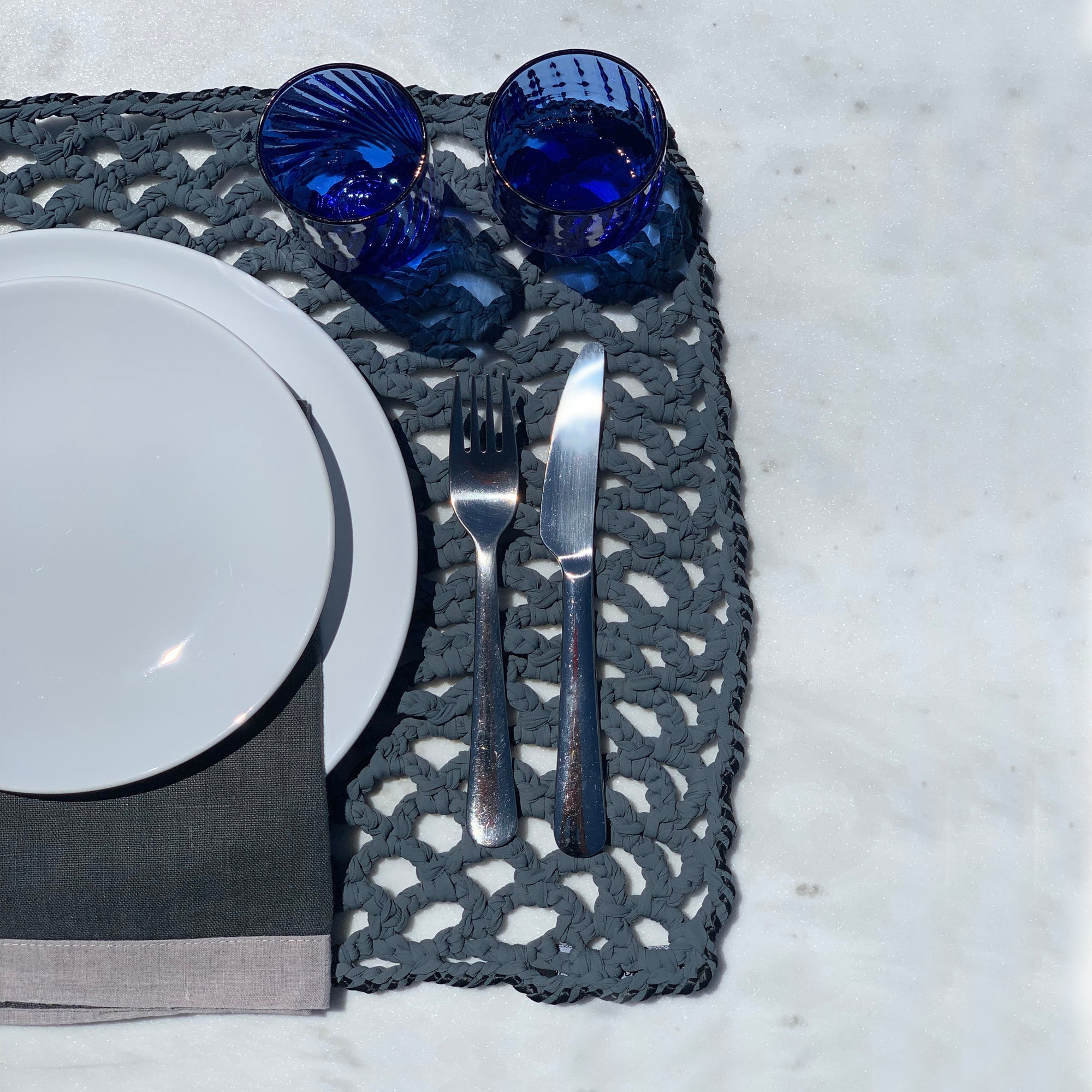 Raffia Square table set for 4 people designed by alexandra koumba