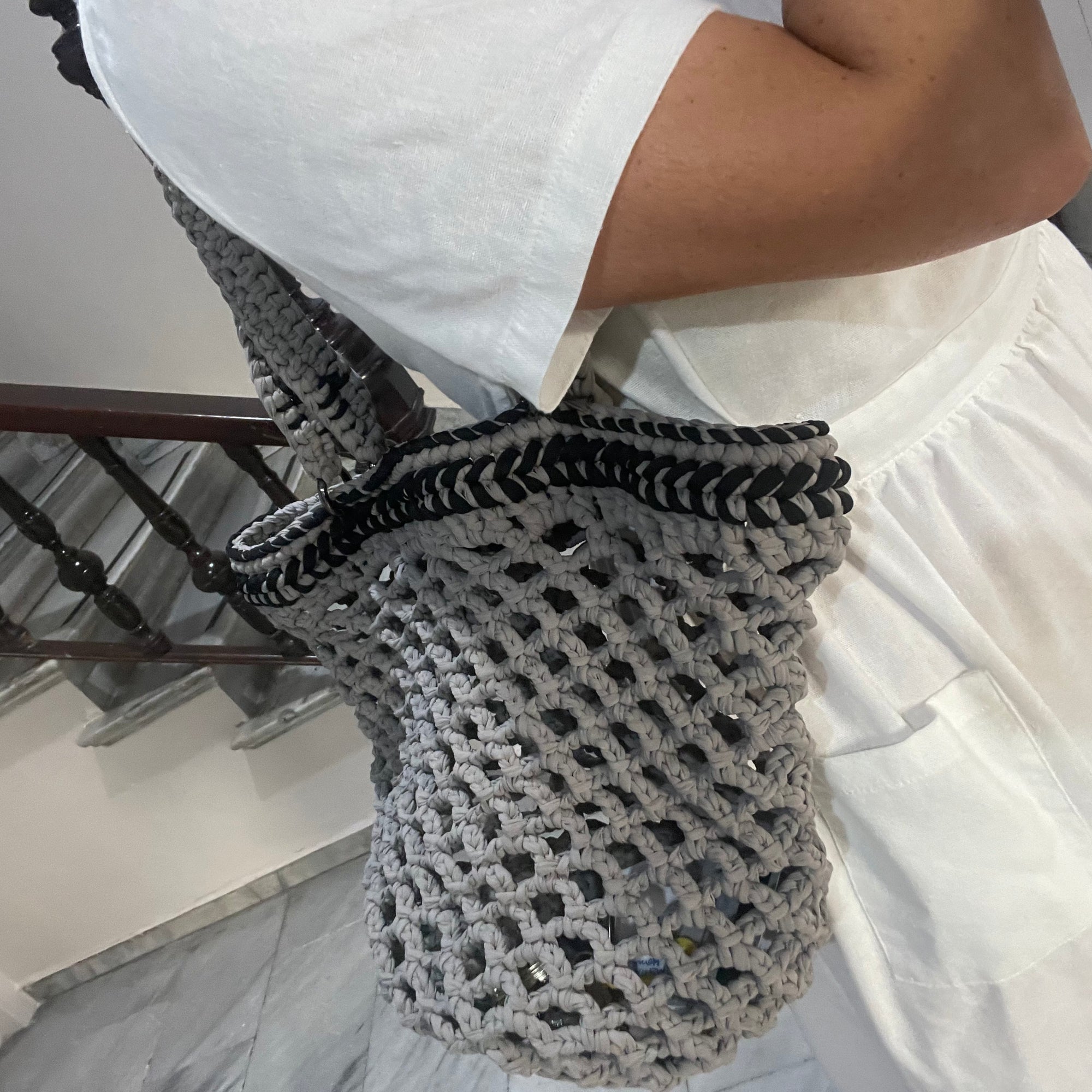 Fishnet raffia Daybag designed by alexandra koumba