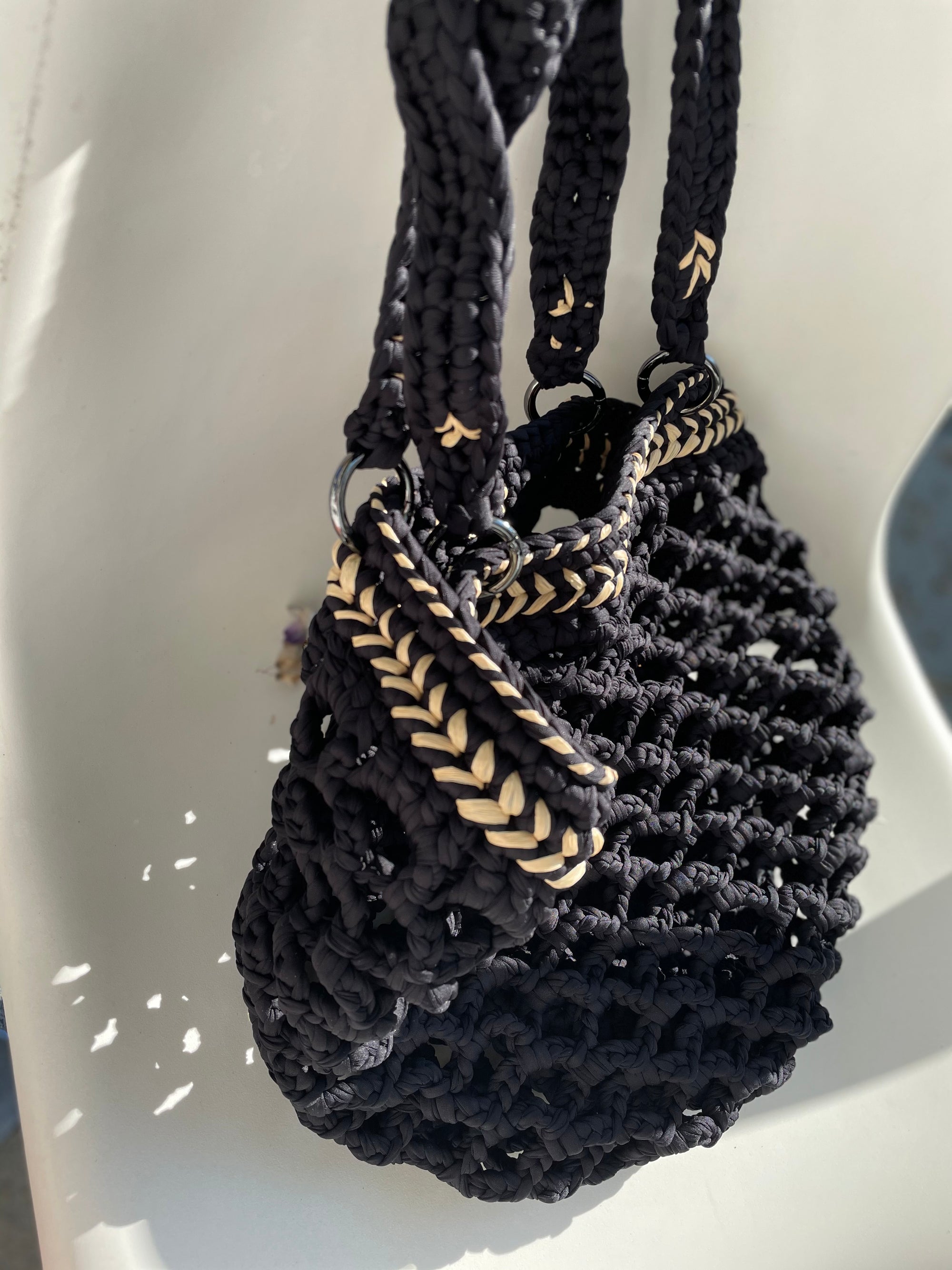 Fishnet raffia Daybag designed by alexandra koumba