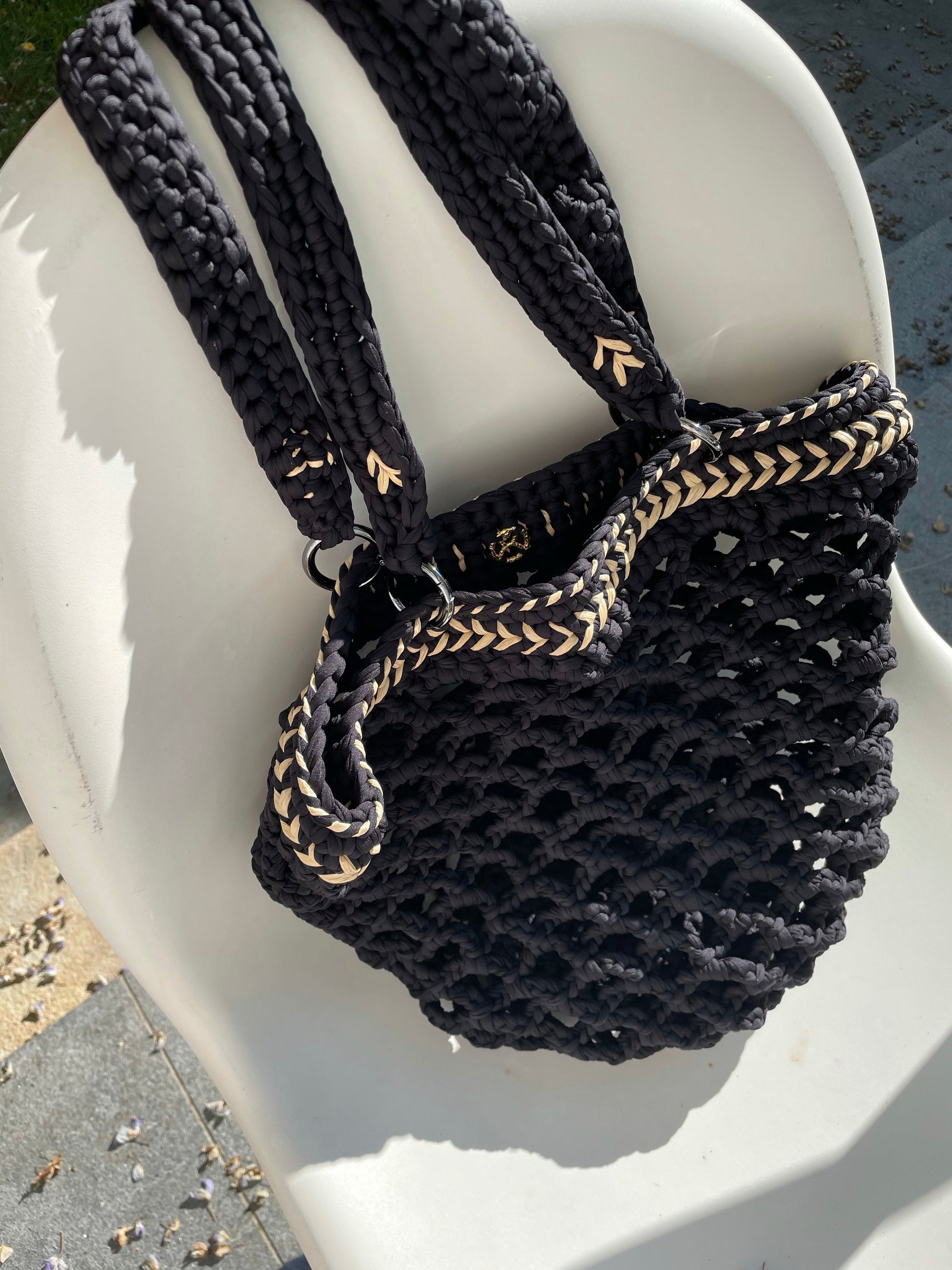 Fishnet raffia Daybag designed by alexandra koumba