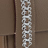 this is the waterproof signature chain's detail hand stitched designed by Alexandra Koumba