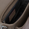 view of the interior pocket of the Signature Messenger bag by Alexandra Koumba in taupe leather and silver chain